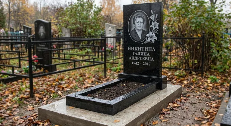 Памятник с гравировкой лилий — выполненная работа «Никитина» в Казани