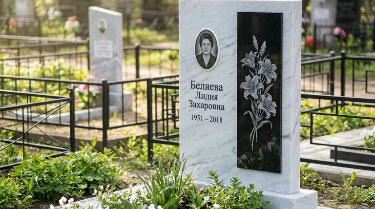 Памятник с гравировкой лилий — выполненная работа «Беляева» в Казани