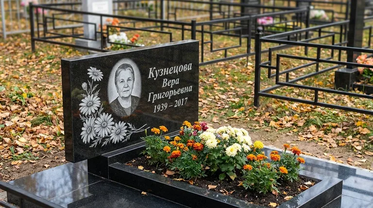 Памятник с гравировкой ромашек — выполненная работа «Кузнецова» в Казани