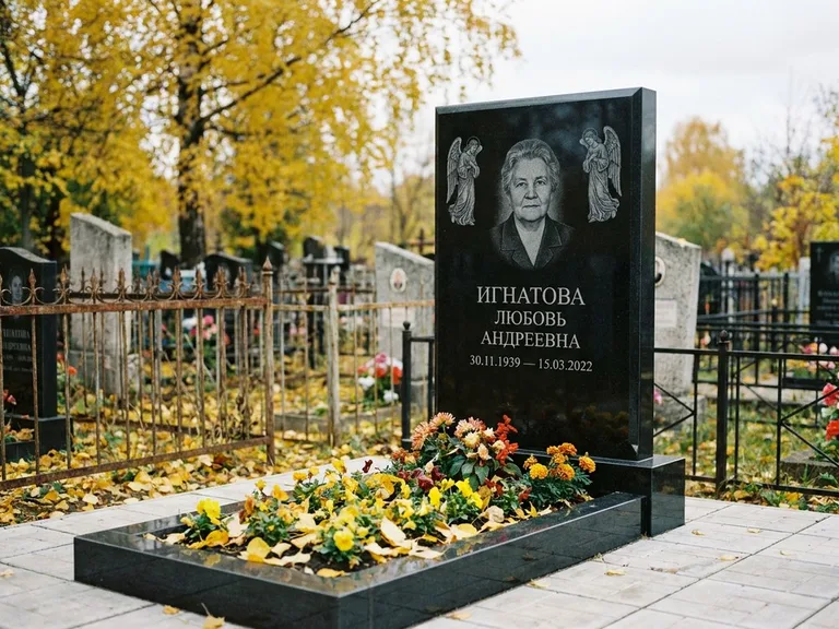 Памятник с гравировкой ангела — гравировка двух ангелов по сторонам портрета, работа «Игнатова» в Казани